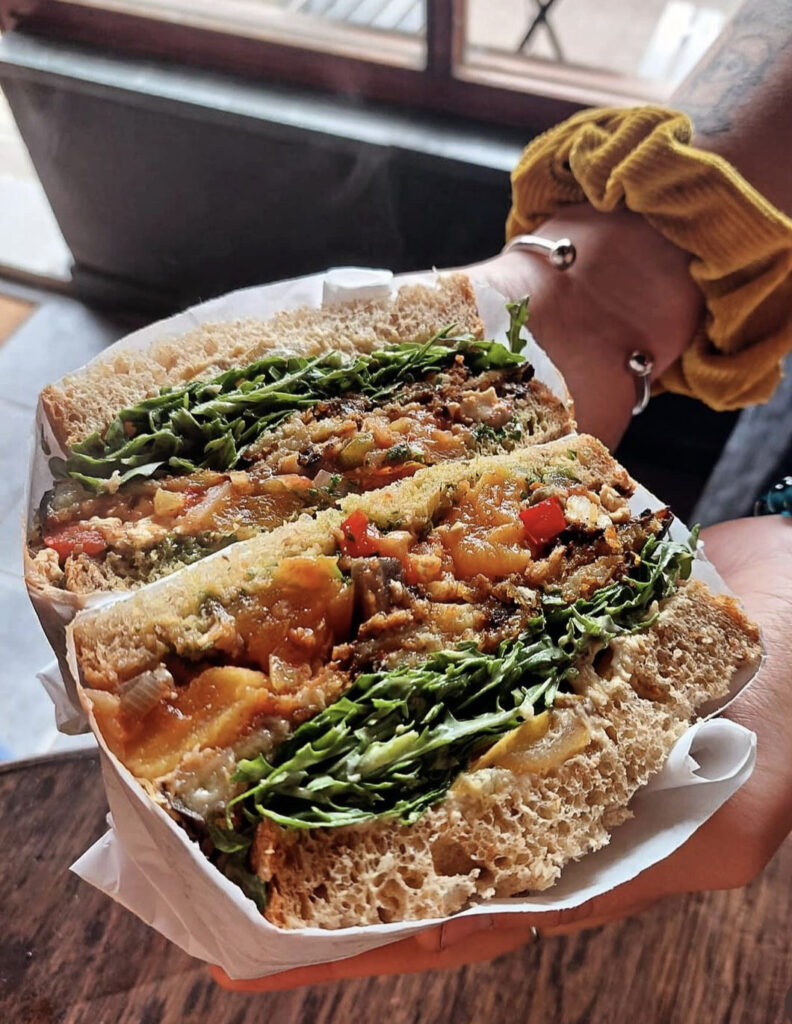 Ex-apprentice of Marco Pierre White, Ben Harrison, opens 'Stax' on Towan Beach, Newquay, combining his passion for food and vinyl music. His creative sandwiches are a hit.