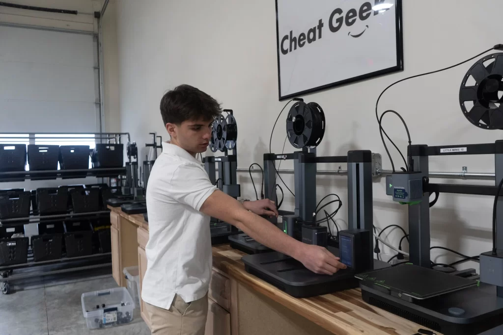 Teen entrepreneur Michael Satterlee earns £15k a month selling shoe charms while balancing school, reinvesting profits, and planning future 3D printing ventures.