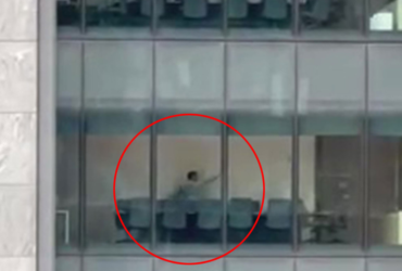 VIDEO: BUSINESSMAN PERFORMS KUNG FU KICKS IN MEETING ROOM TO 'PSYCHE HIMSELF UP