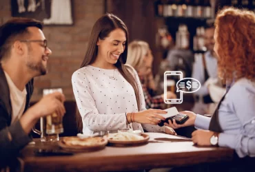 image showing waiter accepting payments digitally using card reader