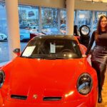 estate agent is offering a complimentary Porsche with condo purchases in Montréal or Vancouver, leaving property buyers stunned.