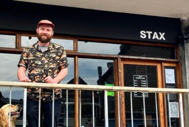 Ex-apprentice of Marco Pierre White, Ben Harrison, opens 'Stax' on Towan Beach, Newquay, combining his passion for food and vinyl music. His creative sandwiches are a hit.