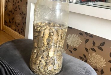 West Yorkshire man saves £5,000 by collecting £1 coins in a Coca-Cola bottle over four years. His TikTok video revealing the total goes viral with 1.6 million views.