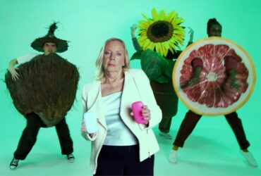 Deborah Meaden stars in a 90s rap-inspired video for Fussy, promoting natural deodorant with catchy lyrics and battling 'aluminium aliens' to banish body odour sustainably.